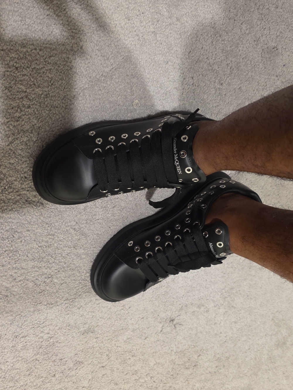 Alexander McQueen Black High-Top Leather Sneakers with Metal Eyelets
